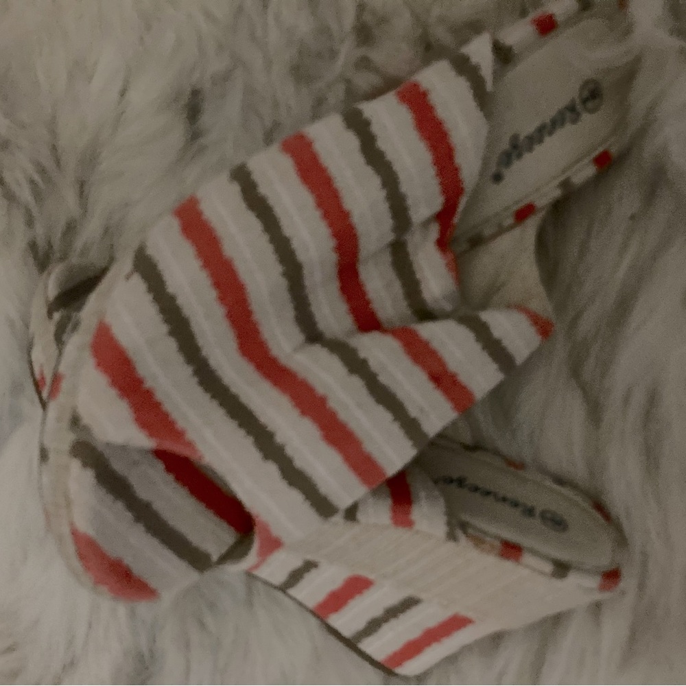 Cream cloth base with strips on orange, army green & white strips with a wedge
